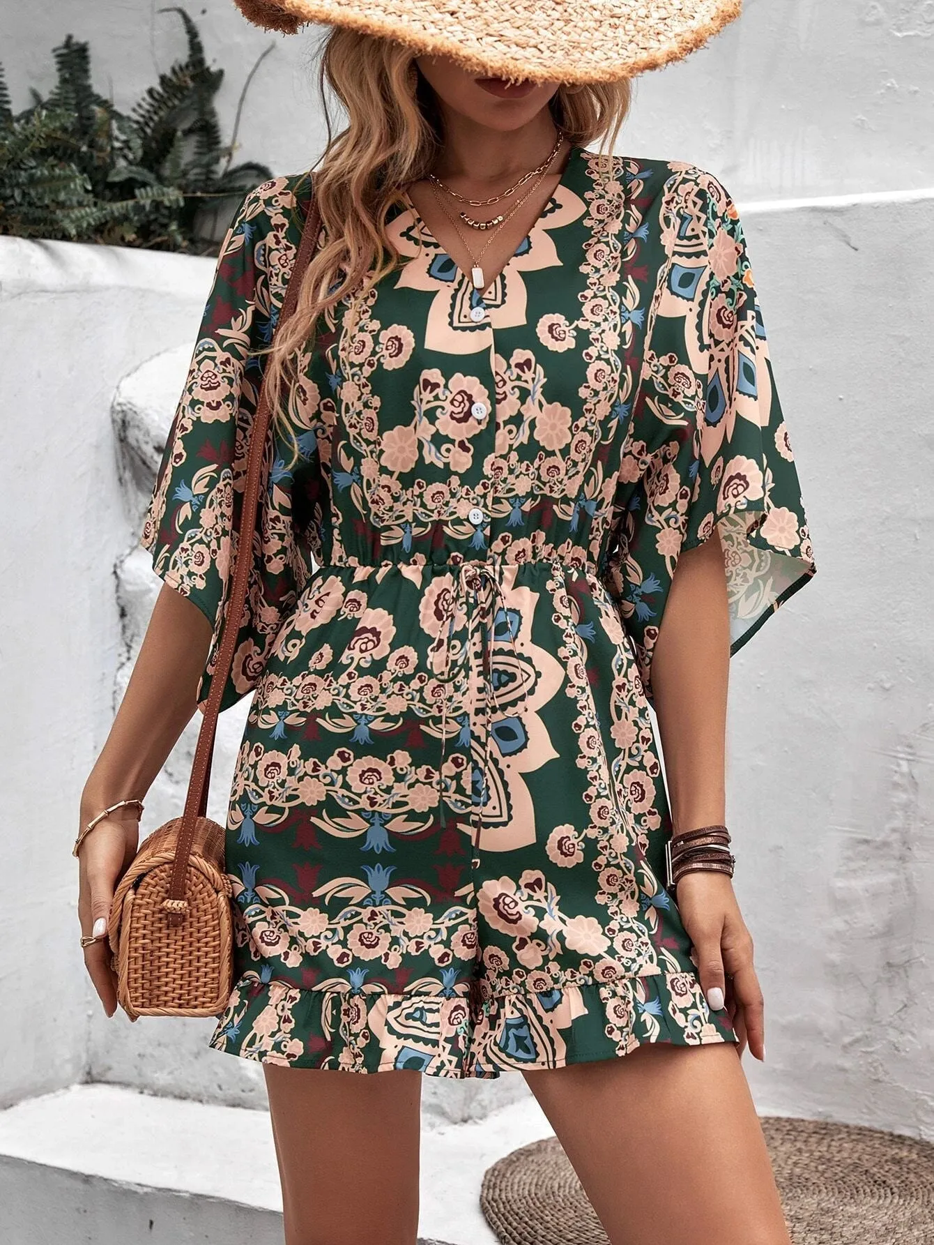 Allover Floral Print Batwing Sleeve Ruffle Hem Romper