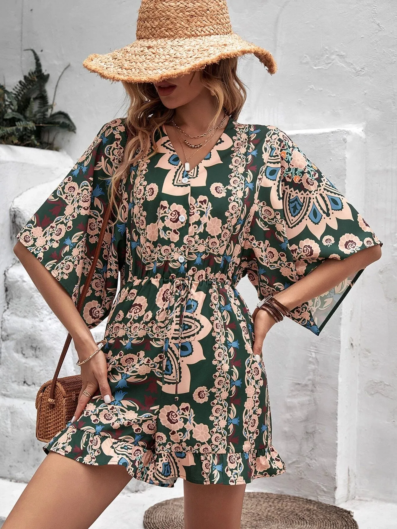 Allover Floral Print Batwing Sleeve Ruffle Hem Romper